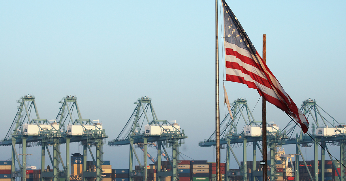 Image of U.S. flag above a port