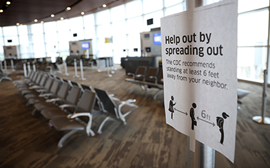social distancing sign at airport
