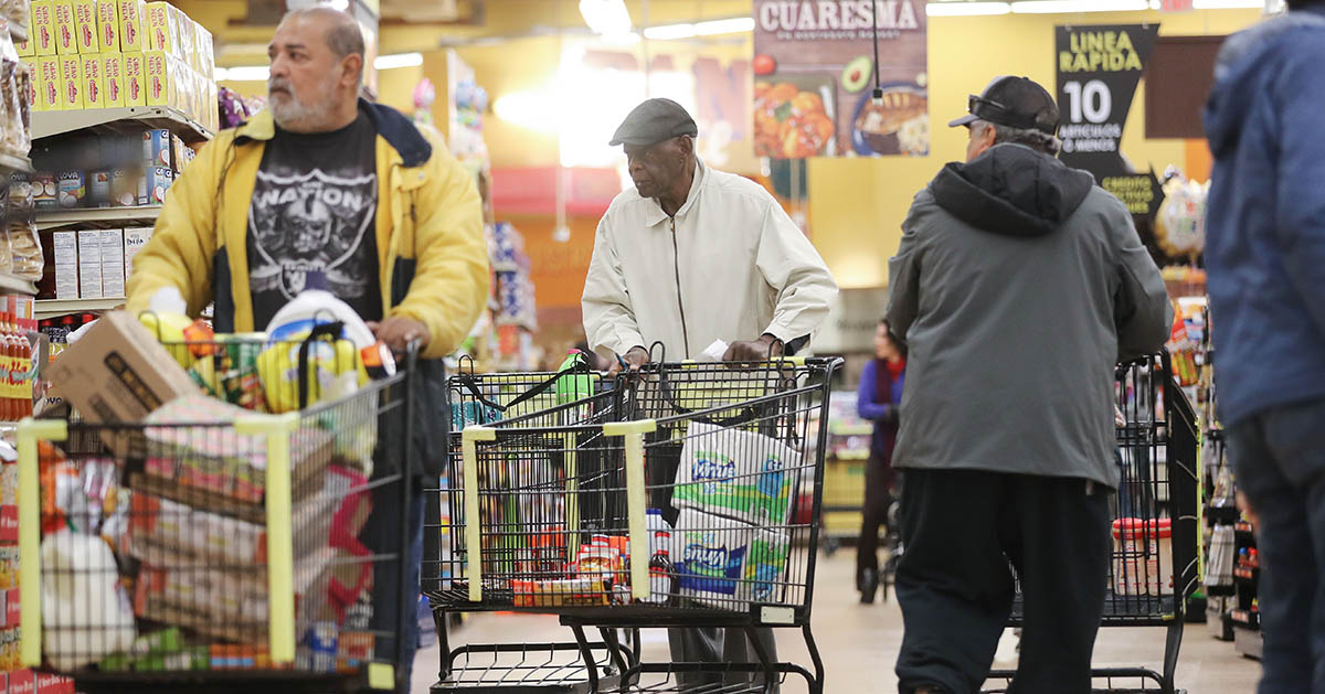 Elderly people grocery shopping