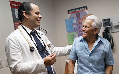 Doctor and patient smiling at each other