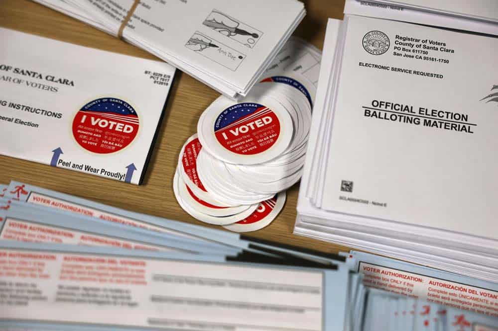 Election materials are displayed on a tabl