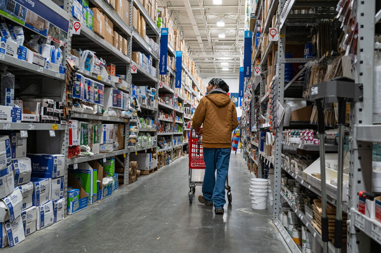 People shop at a home improvement store