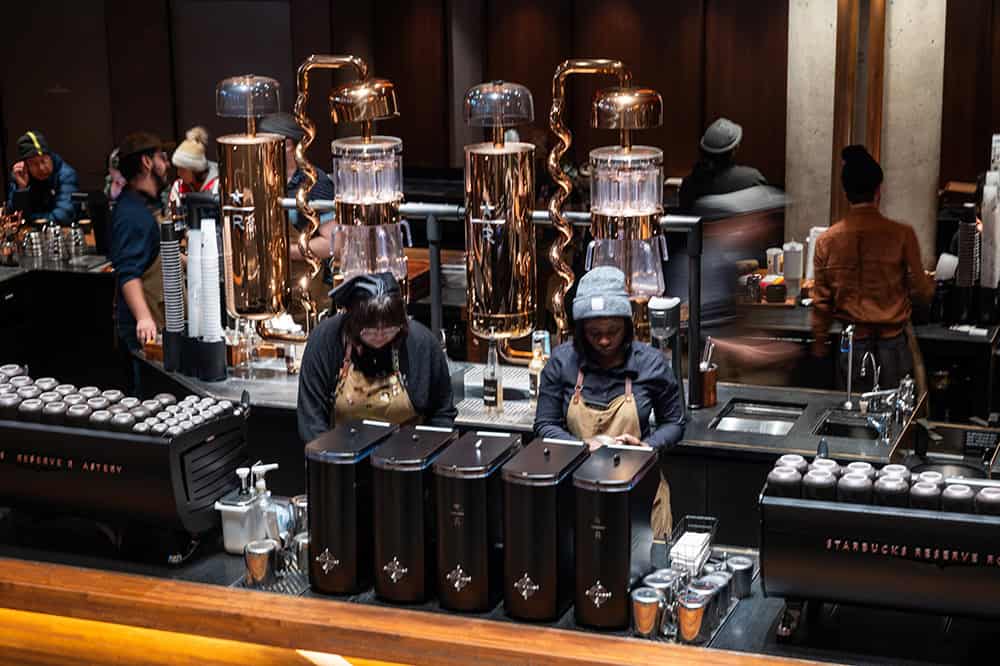 Baristas working in a cafe